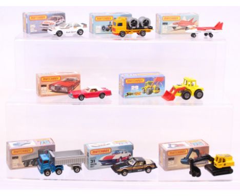 Matchbox: A collection of eight assorted boxed Matchbox 75 Series vehicles to comprise: Audi Quattro 25, Cable Truck 26, Swin