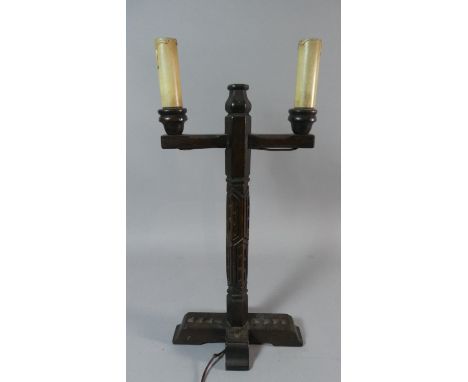 An Edwardian Carved Oak Two Branch Gothic Style Table Lamp, 46cm high 