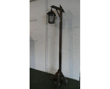 An Edwardian Oak Lantern Style Standard Lamp