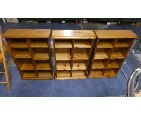 A Set of Three Ducal Pine Shelf Units, Each 49cm Wide 