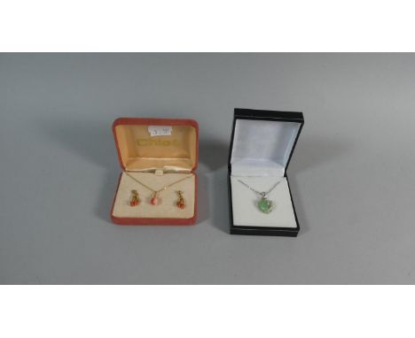 A Gilt Metal and Coral Suite and a White Metal Mounted Jade Pendant with White Stones 