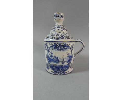 A Continental Delft Candle Stick with Pierced Lid, 22cm Wide 