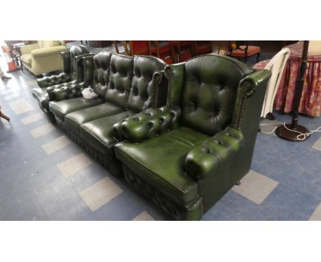 A Button Upholstered Green Leather Three Piece Suite 