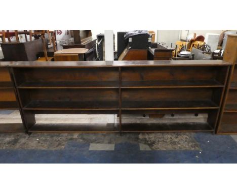 An Edwardian Stained Pine Two Division Three Shelf Open Bookcase, 248cm Wide 