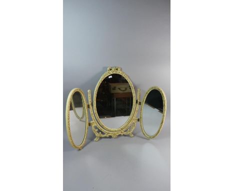 A Cream and Gilt Triple Dressing Table Mirror with Oval Glass, 57cm High 