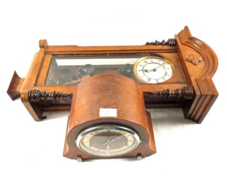 A Walnut wall clock and a striking mantel clock