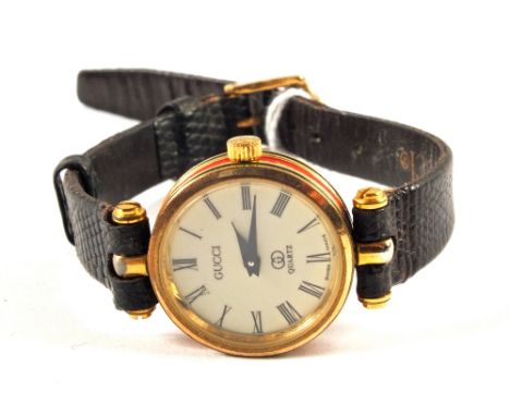A vintage circa 1980's lady's Quartz wristwatch marked Gucci with red and green enamel