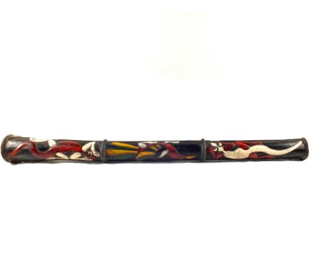 A Didgeridoo with carved and painted bird and crocodile decoration, length 48"