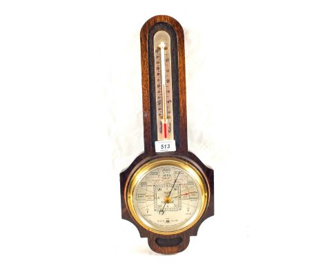 An Oak Short & Mason barometer