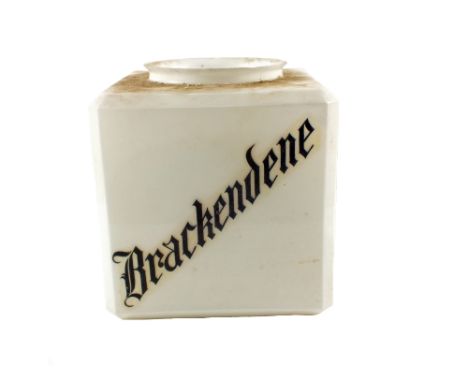 A glass lamp shade with house name