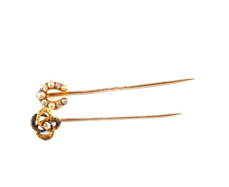 A Gold Diamond and Pearl horseshoe shaped stick pin, together with a Gold single Diamond stick pin