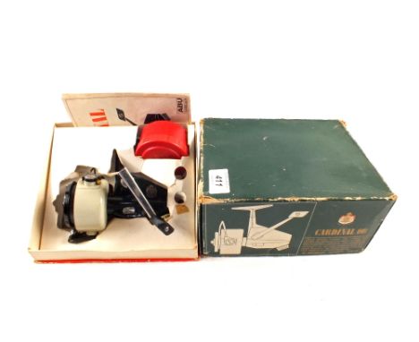 An Abu Cardinal 66 spinning reel in original box, spare spool and manual, foot stamp 050603