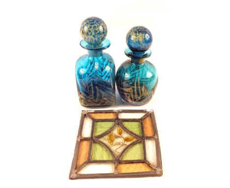 Two Medina decanters and a small leaded light