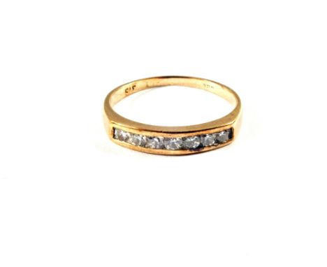 A 9ct Gold ring set with seven Diamonds, size R