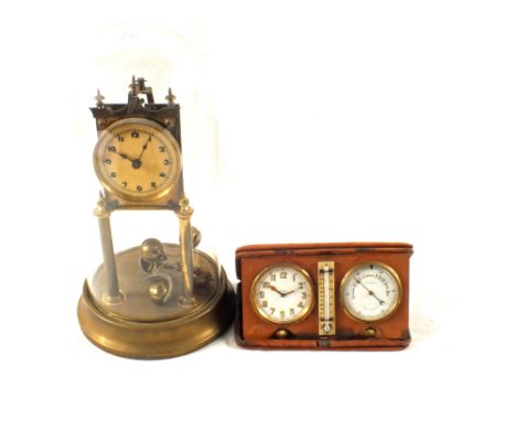 A dome clock plus a travelling clock and a barometer set