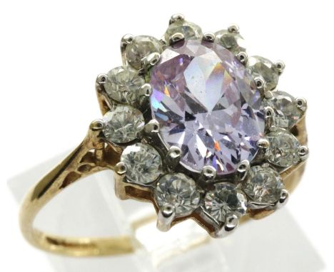 9ct gold daisy ring set with amethyst and CZ, size P, 2.2g. P&amp;P Group 1 (£14+VAT for the first lot and £1+VAT for subsequ
