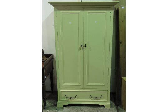 A Cream Painted 20th Century Two Door Wardrobe Single Drawer Under