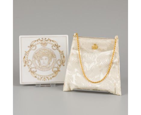 A lot consisting of a handbag and tile decorated with Medusa. Versace.