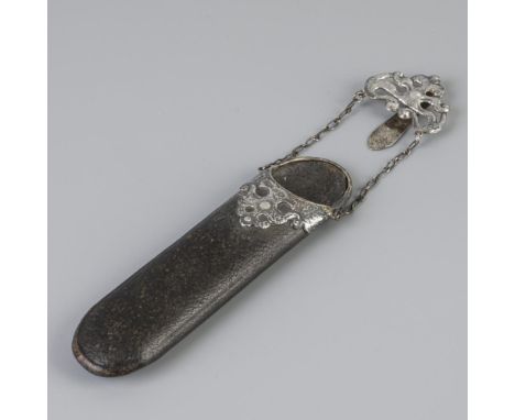 With a leather case topped with hammered silver fittings. With two-chain skirt hook. United Kingdom, London, Henry Williamson