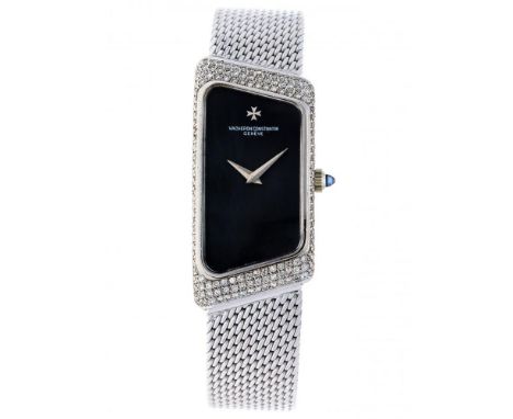 Case: white gold (18 kt.) - bracelet: white gold (14 kt.) - manual winding - diameter: 18 x 36 mm -wristsize: 17.5 cm - sapph