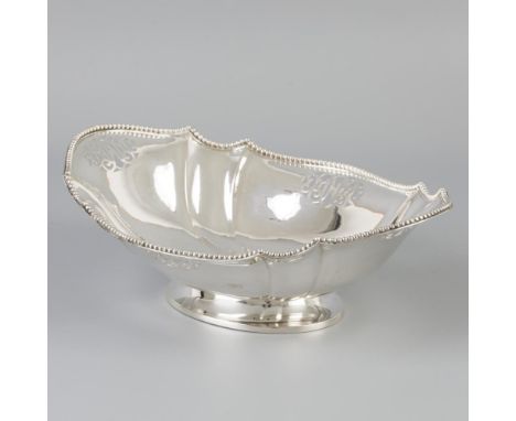 Oval model with partial openwork and lobed parts, standing on foot. The Netherlands, Voorschoten, Zilverfabriek Voorschoten, 