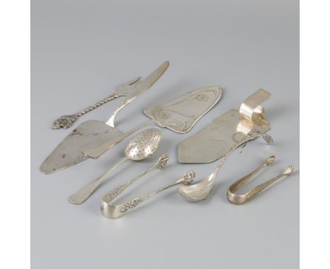 Consisting of three assorted cake scoops, herbal tea spoon, cake fork, jam spoon and two sugar cube tongs. Netherlands, 20th 