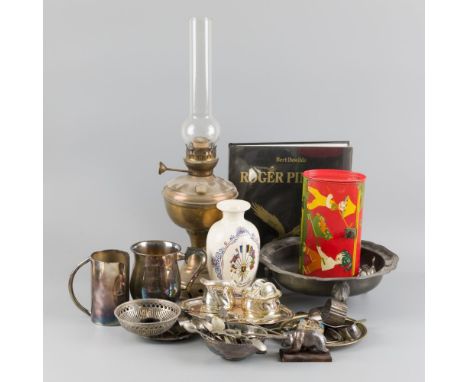 Various silver-plated objects with an oil lamp.