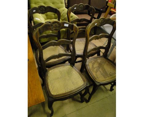 A set of 4 French ladder back and cane seated dining chairs.