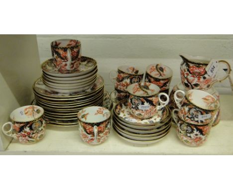 Extensive early 20th century Royal Crown Derby tea service including 2 cake plates, cream jug and bowl, pattern no. 383.