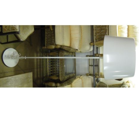 A white Ikea standard lamp.