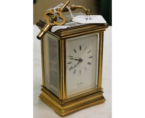 A brass cased carriage clock presented by Birds Eye Wall's 1981.