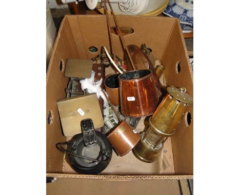 A miner's lamp, postal scale, etc.