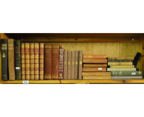 A shelf of various books.