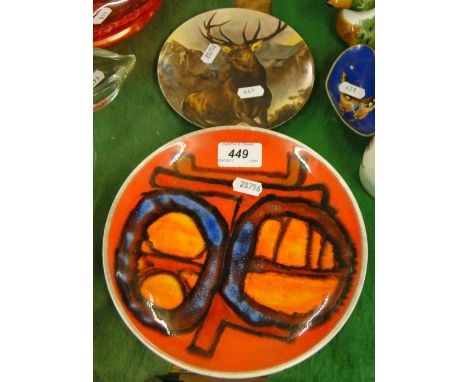 Poole Delphis plate and a Poole stag plate.