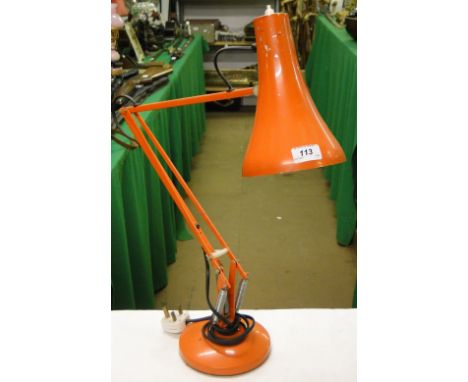 A Vintage orange angle poise table lamp.