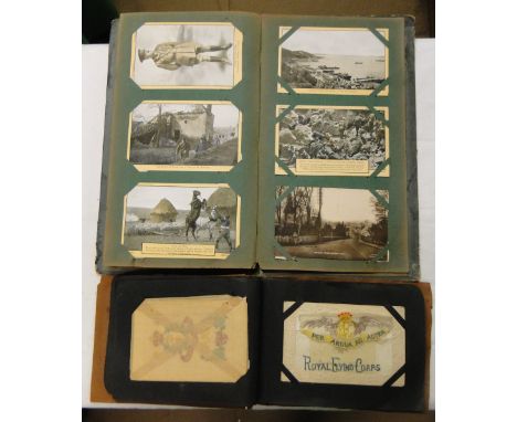 A postcard album including First World War silks and another - topographical and Wartime.