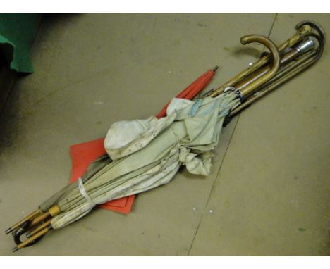 Umbrellas and walking stick.
