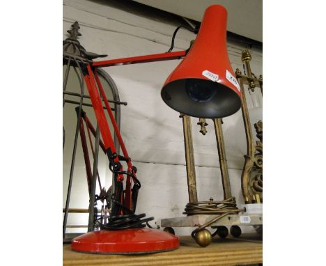 A Vintage red angle poise table lamp.