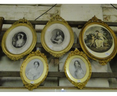 2 Pairs of 19th century carved giltwood oval frames with inset portrait engravings of young ladies and another, (5).