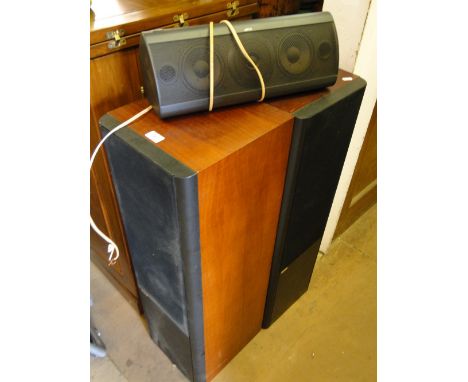 A pair of floor standing Jamo speakers and a smaller Jamo speaker.