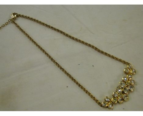 A Christian Dior costume necklace.