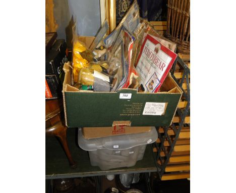 Box of teddybears as new, box of a home alarm system and a box with a cover for a T V R.