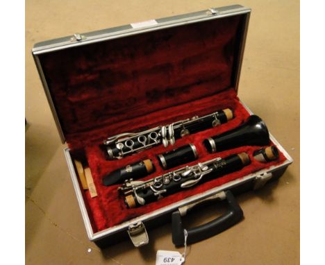 A cased Boosey & Hawkes clarinet.