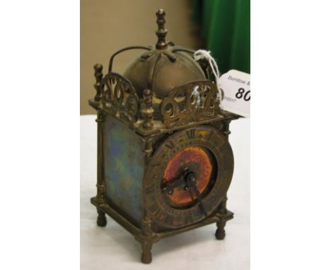 A small brass lantern clock by Smith's & Day.