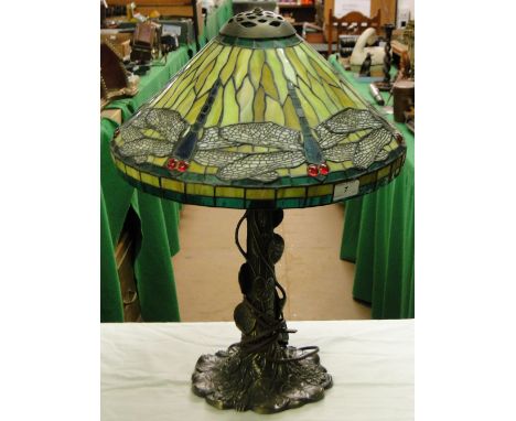 A Tiffany style table lamp with dragonfly design shade.