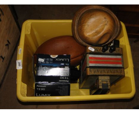 Harrow Rugby Club ball, an accordion, camera, etc