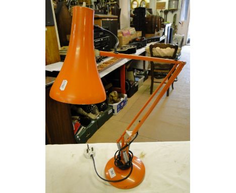 A Vintage orange angle poise table lamp.