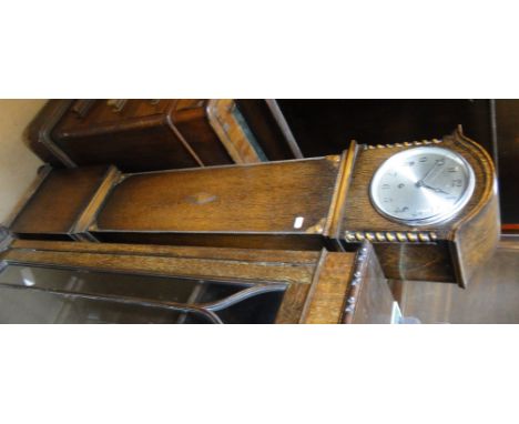 An Edwardian oak Grandmother clock with 3-train movement.