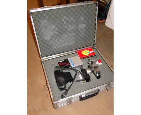 A Praktica camera and various accessories, cased.