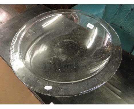 A large clear glass table centre bowl.